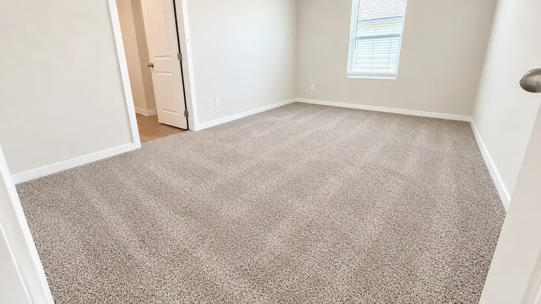 Spacious, unfurnished interior of a new home in Waldron Estates, Corpus Christi (Image 17).
