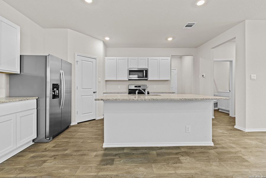 Furnished interior view inside a new home in Redbird Ranch, San Antonio (Image 7).