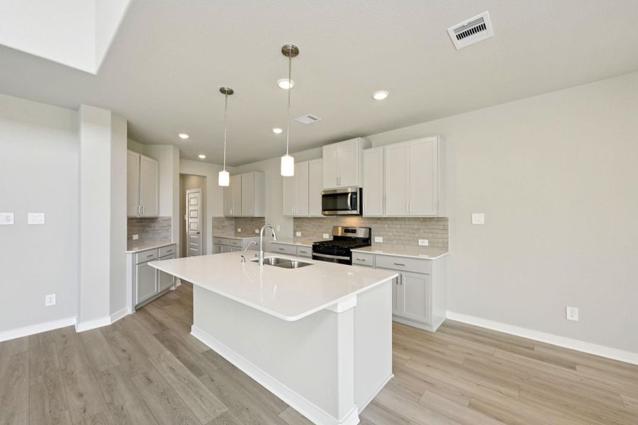 Photo is not of the actual home, but is an inspirational photo of builder’s model home and may depict options, furnishings, and/or decorator features that are not included