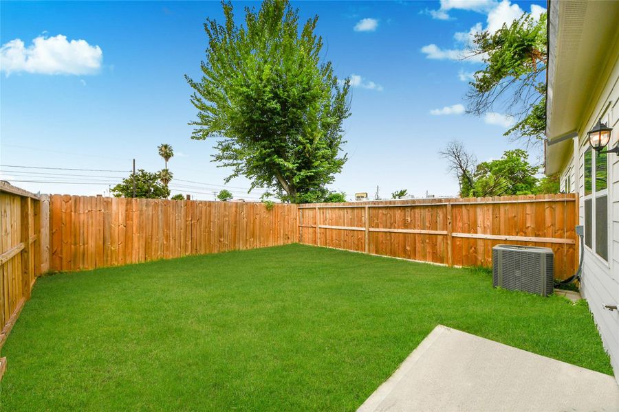 Exterior details and patio area of a home in , Houston (Image 4).