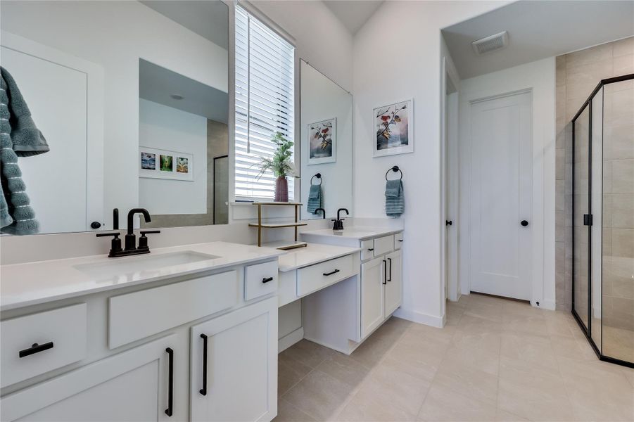 Clean lines and a spacious dual vanity define this modern bathroom retreat. Clean lines and a spacious dual vanity define this modern bathroom retreat.