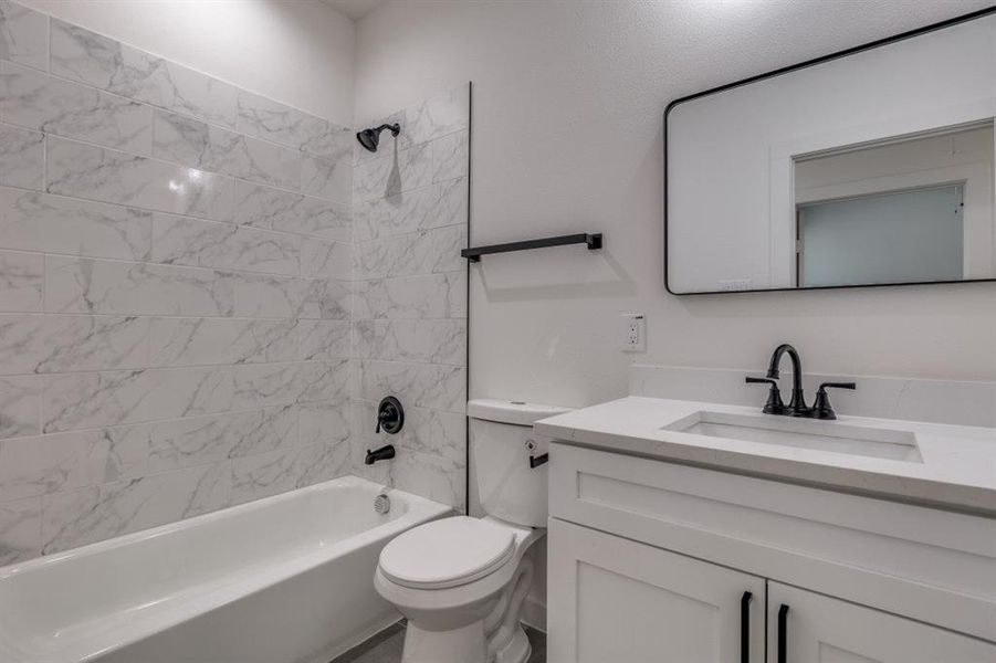 Bathroom featuring shower combination and vanity Bathroom featuring shower combination and vanity
