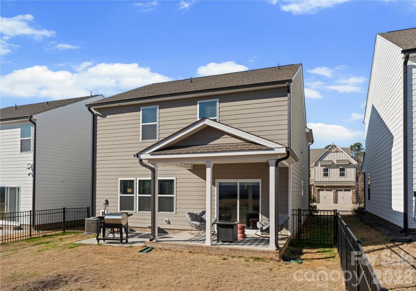 Exterior details and patio area of a home in Scotch Meadows, Monroe (Image 22).