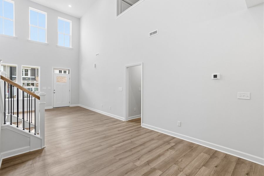 Spacious, unfurnished interior of a new home in Ovation at Sweetbrier, Durham (Image 19).