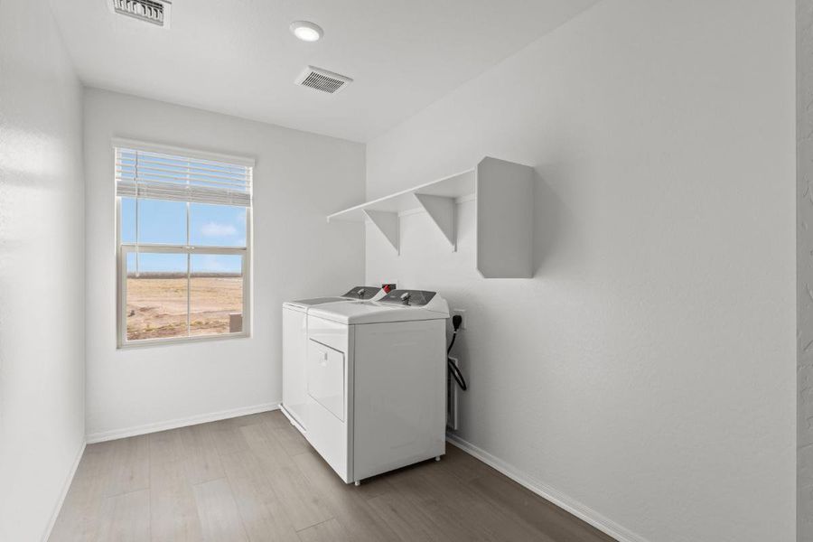 Furnished interior view inside a new home in Skyline Village Enclaves, San Tan Valley (Image 8).