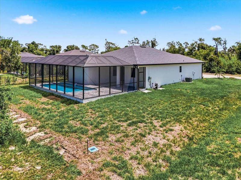 Exterior details and patio area of a home in , Rotonda West (Image 26).