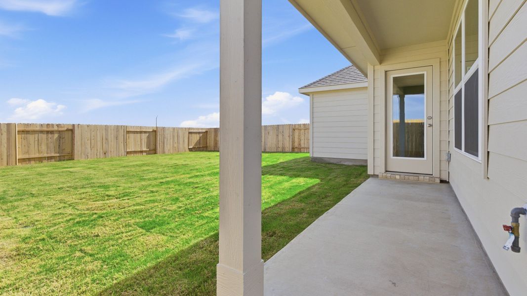Exterior details and patio area of a home in Infinity Square, Kyle (Image 3).