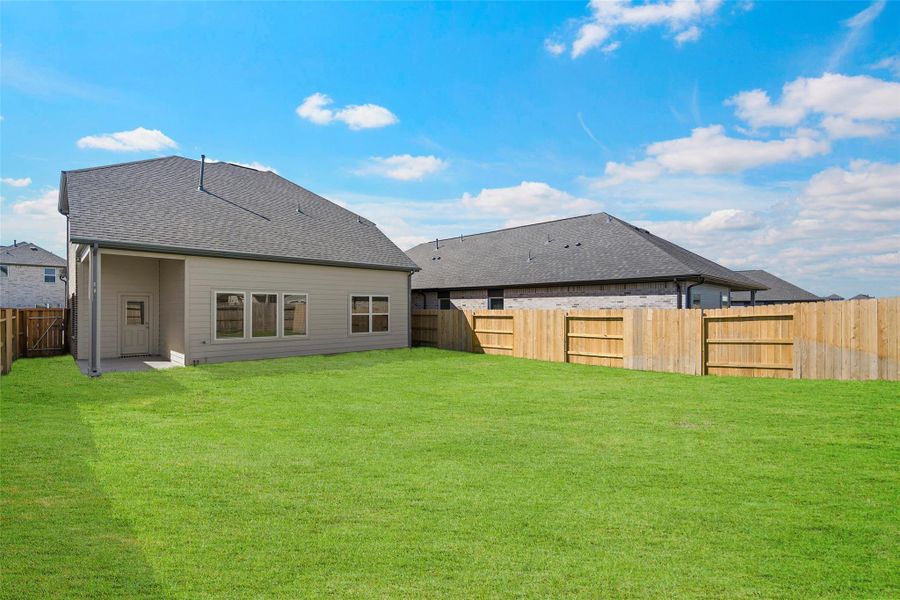 Covered patio extends your living space outdoors for year-round enjoyment. Covered patio extends your living space outdoors for year-round enjoyment.