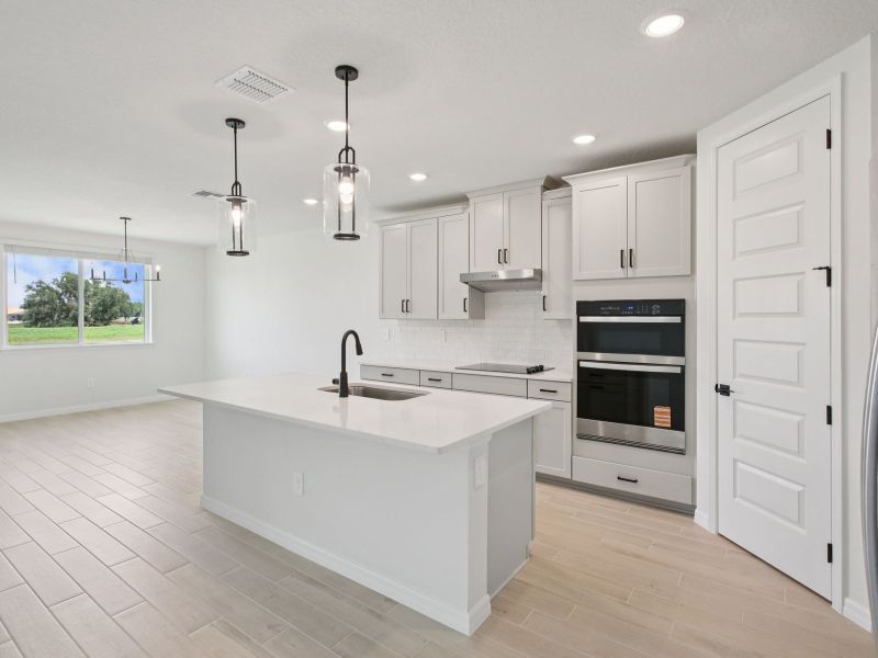 Furnished interior view inside a new home in Two Rivers - Signature Series, Zephyrhills (Image 3).