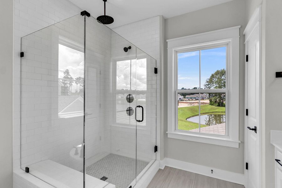 Furnished interior view inside a new home in Tidewater at Lakes of Cane Bay, Summerville (Image 9).
