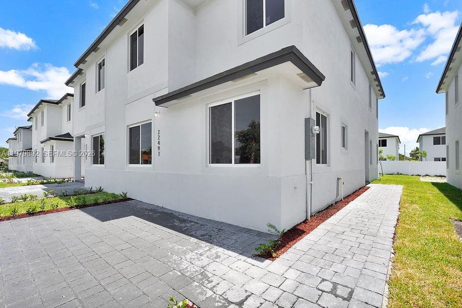 Exterior details and patio area of a home in , Miami (Image 3).