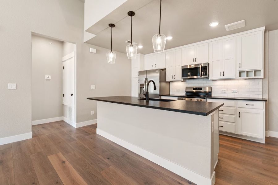 Furnished interior view inside a new home in The Lakes at Centerra - North Shore Flats, Loveland (Image 12).