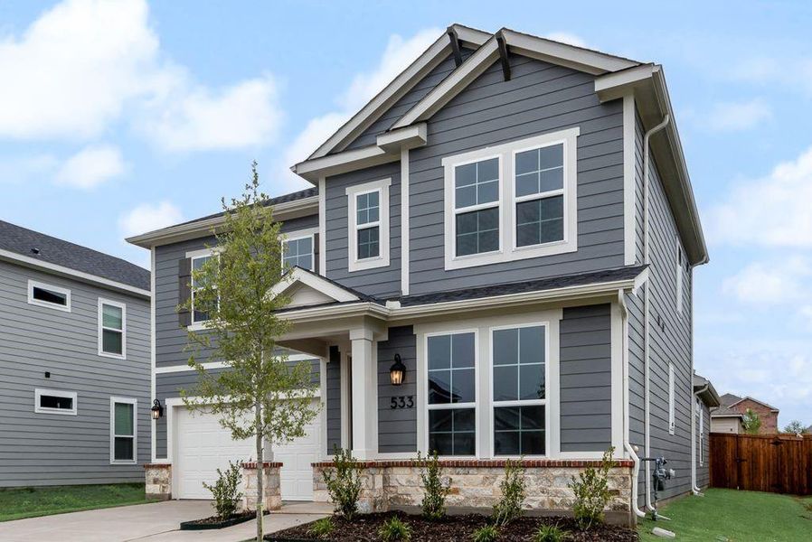 Front exterior of a new home in Creekside of Crowley, Crowley, TX, highlighting curb appeal (Image 23).