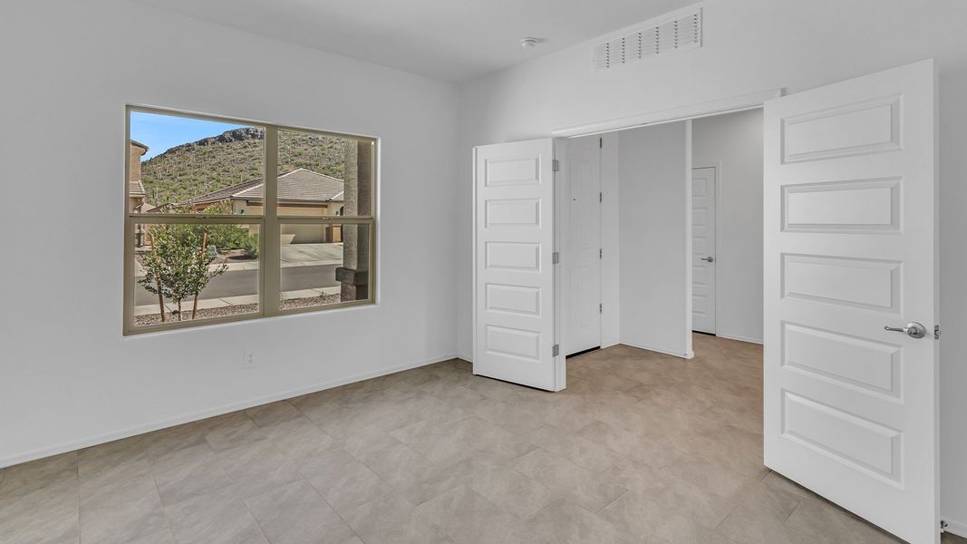 Representative unfurnished interior of a home built from the Pearl by D.R. Horton in Saguaro Bloom, Marana (Image 20).