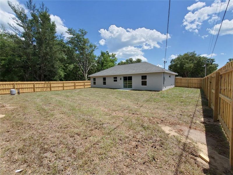 Front exterior of a new home in , Dunnellon, FL, highlighting curb appeal (Image 27).