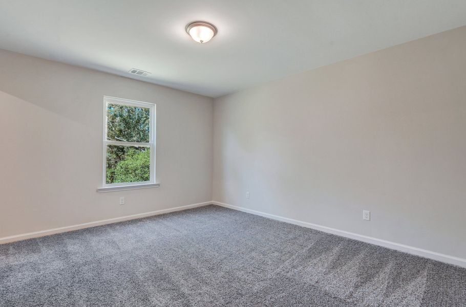 Spacious, unfurnished interior of a new home in Settlers Hammock, Kingsland (Image 32).