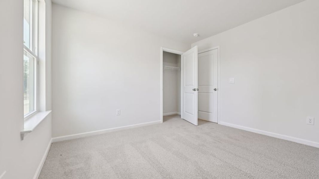 Spacious, unfurnished interior of a new home in Gretchen Pines, West End (Image 22).