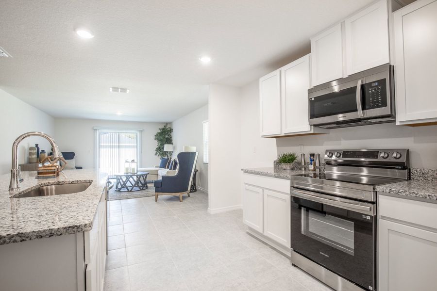Representative furnished interior of a home built from the Violet by Maronda Homes in Coastal Communities, Edgewater (Image 6). Representative furnished interior of a home built from the Violet by Maronda Homes in Coastal Communities, Edgewater (Image 6).