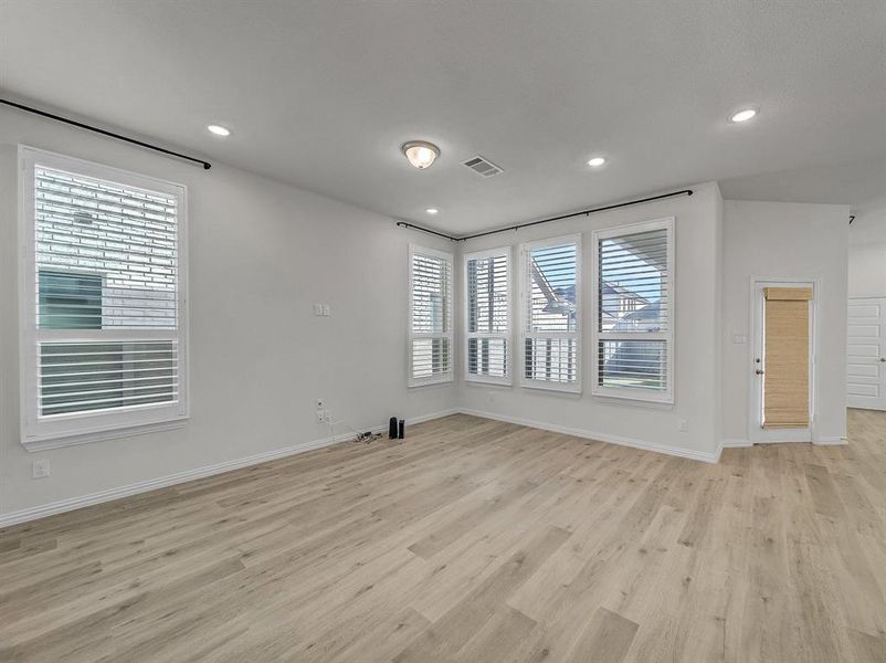 Empty room with light wood-type flooring