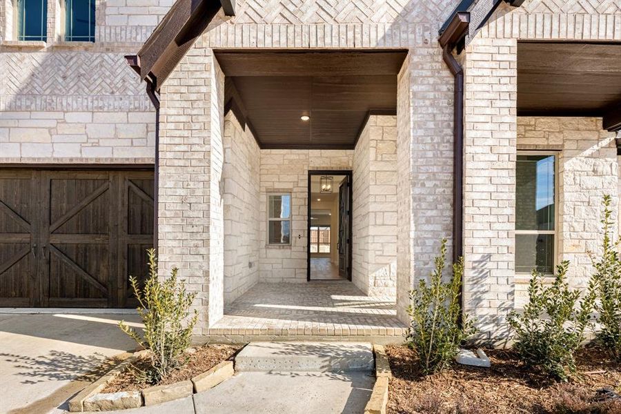 Exterior details and patio area of a home in Windsong Ranch, Prosper (Image 28).