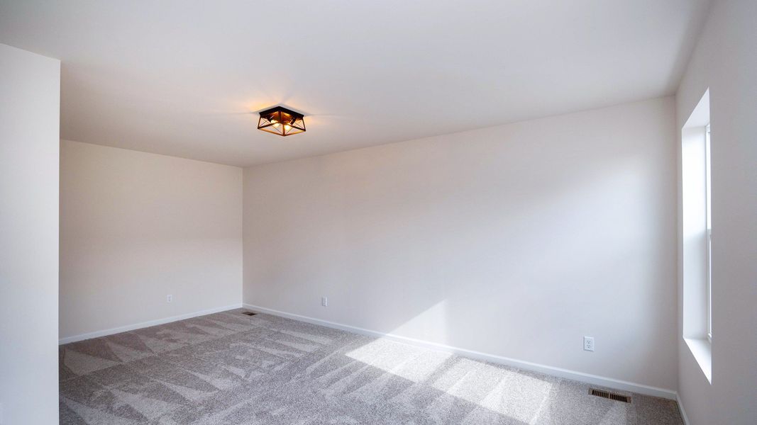 Representative unfurnished interior of a home built from the The Kettering by Norfolk Homes in Preserve at Magnolia Park, Jackson (Image 49).