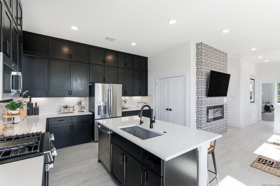 Furnished interior view inside a new home in Centero at Stone Oak, San Antonio (Image 12).