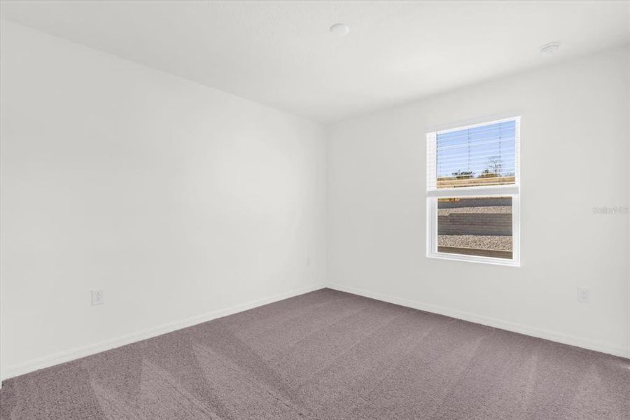 Spacious, unfurnished interior of a new home in Bellaviva III at Westside, Davenport (Image 12).