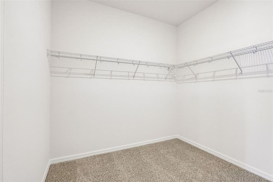 Spacious, unfurnished interior of a new home in The Grove at Stuart Crossing - Signature Series, Bartow (Image 30).