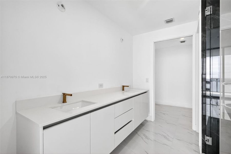 Furnished interior view inside a new home in , Miami (Image 9).