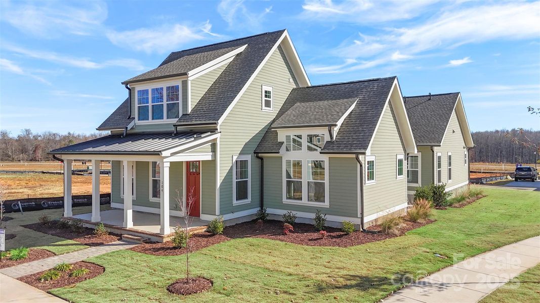 Front exterior of a new home in Riverwalk, Rock Hill, SC, highlighting curb appeal (Image 20).