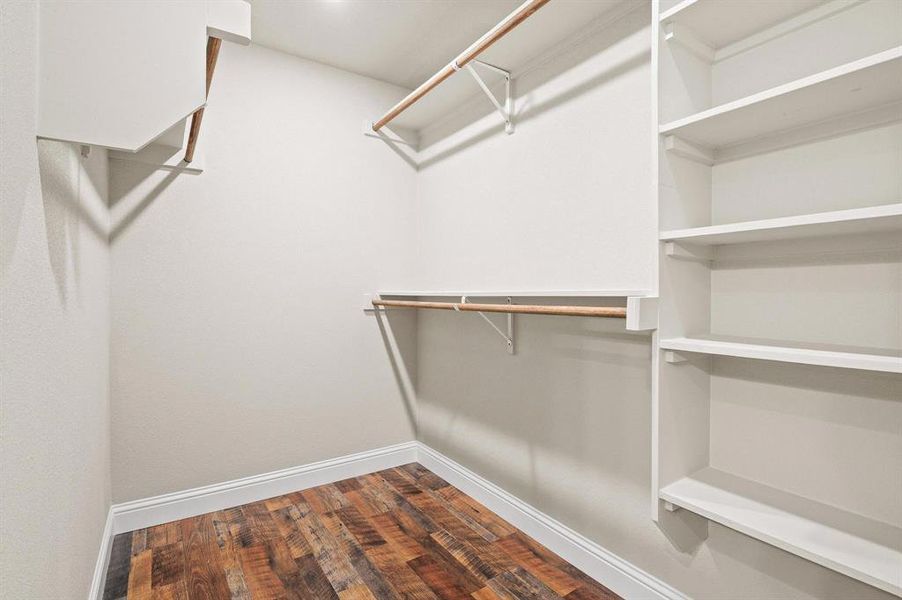 walk-in closet in primary bedroom