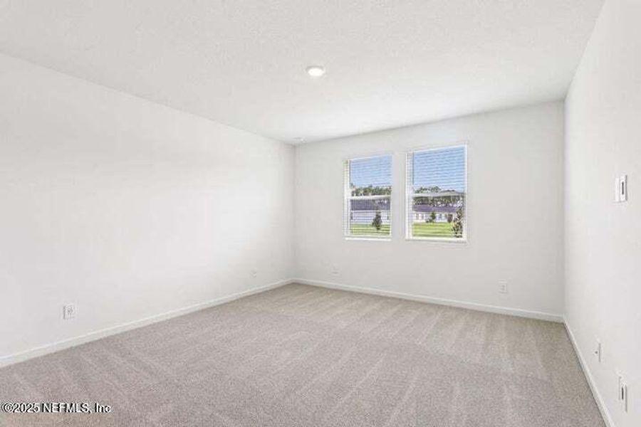 Spacious, unfurnished interior of a new home in Lakes at Bella Lago - Signature Series, Green Cove Springs (Image 26). Spacious, unfurnished interior of a new home in Lakes at Bella Lago - Signature Series, Green Cove Springs (Image 26).