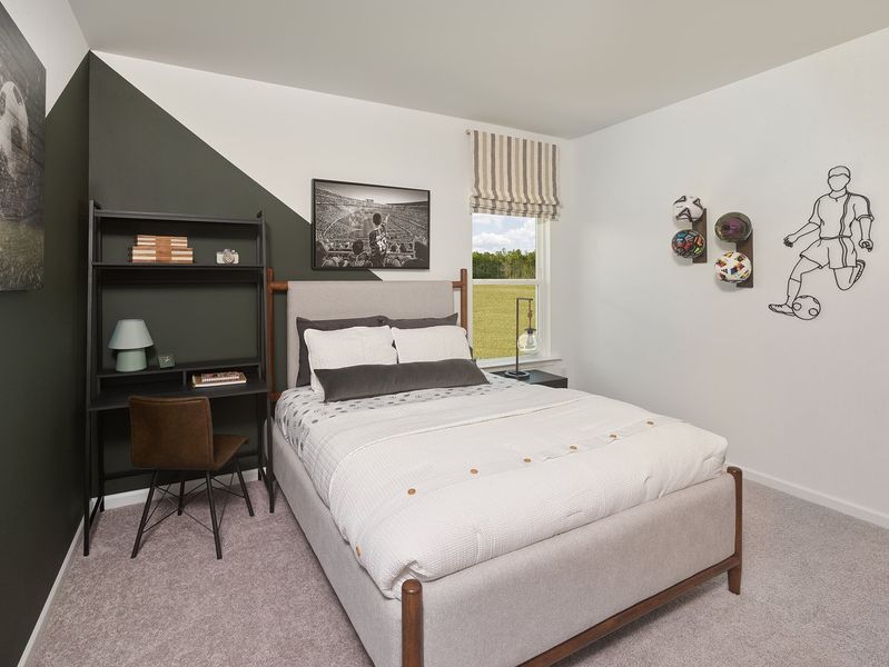 Representative furnished interior of a home built from the Macon by Ashton Woods in Rowland's Grant, Fuquay Varina (Image 14).