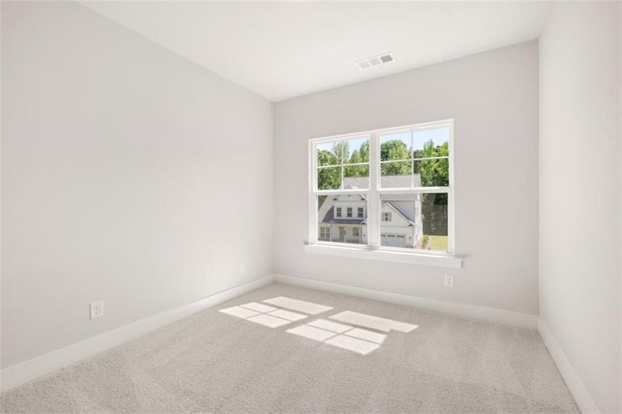 Spacious, unfurnished interior of a new home in Traditions of Braselton, Jefferson (Image 30).
