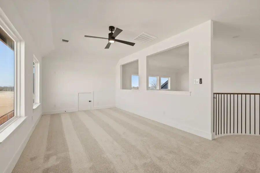 Spacious, unfurnished interior of a new home in Settlers Glen, New Fairview (Image 35).