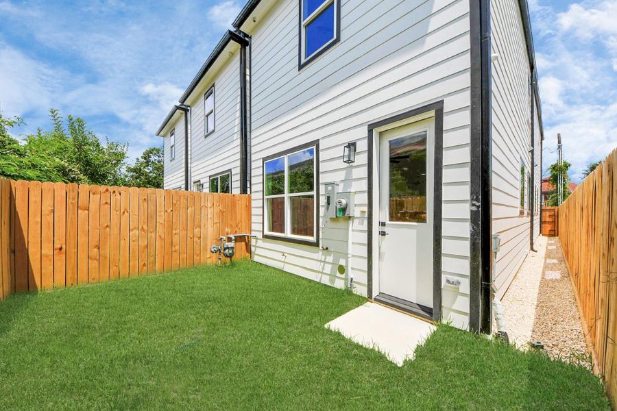 Exterior details and patio area of a home in , Houston (Image 3).
