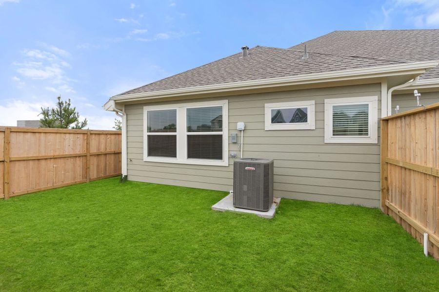 Exterior details and patio area of a home in Meridiana, Manvel (Image 11). Exterior details and patio area of a home in Meridiana, Manvel (Image 11).