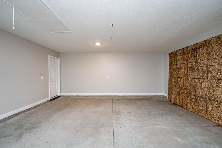 Representative unfurnished interior of a home built from the Saxon by Enchanted Homes in Guadalupe Heights, Seguin (Image 24).