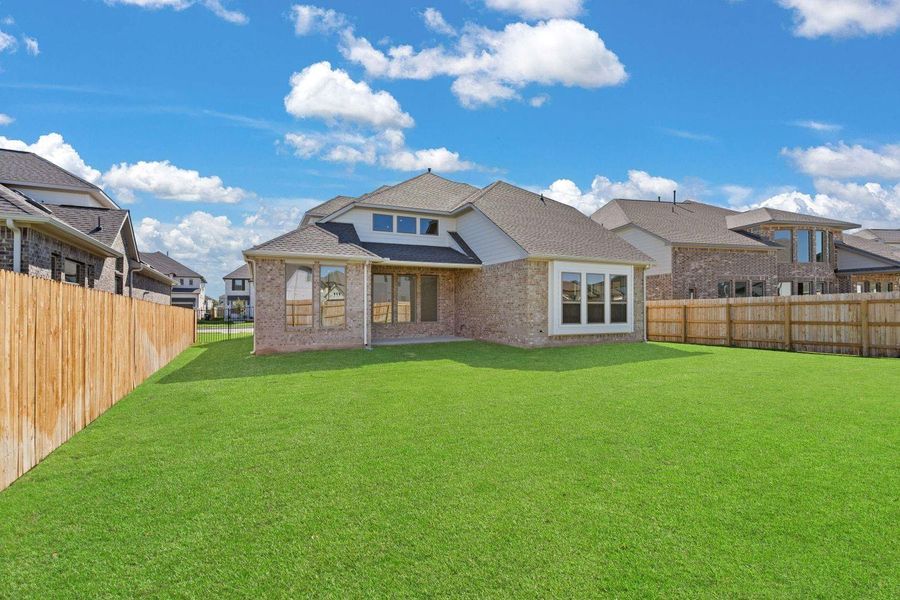 Rear of Home and Private Backyard