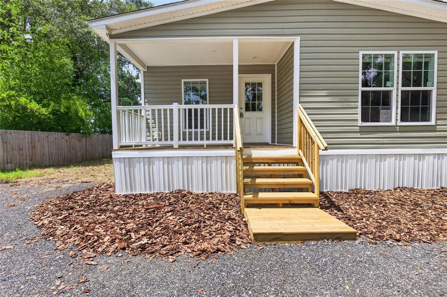 Exterior details and patio area of a home in , Brooksville (Image 28).