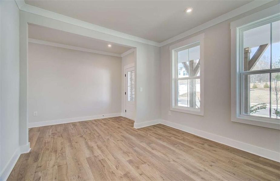 Spacious, unfurnished interior of a new home in The Paddocks at Doc Hughes, Buford (Image 26).