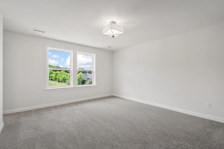 The Beverly B Primary Suite Bedroom