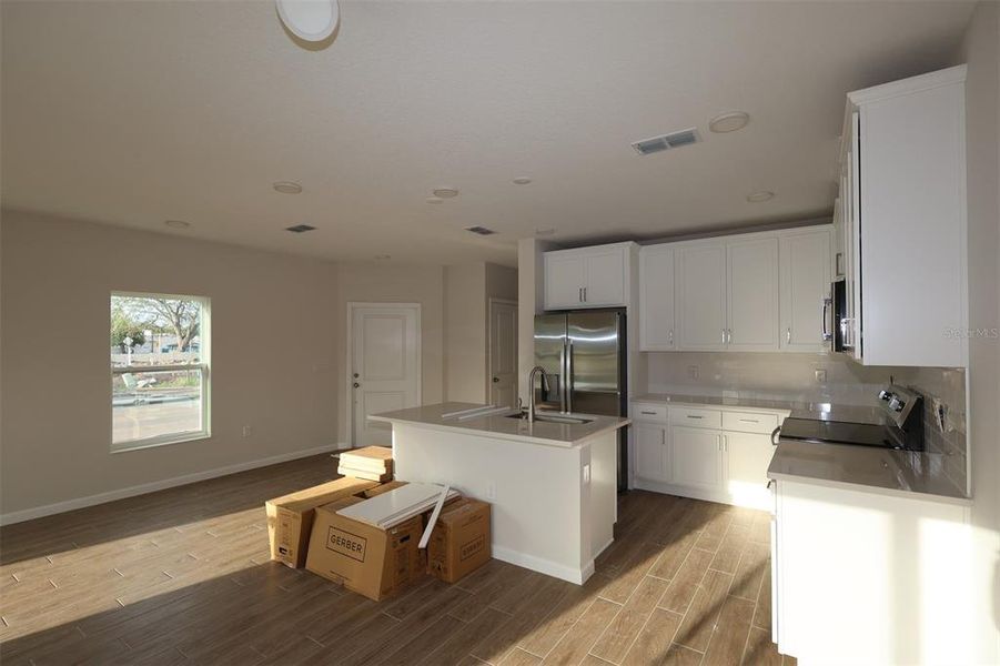 Furnished interior view inside a new home in Reeves Place, Orlando (Image 7).