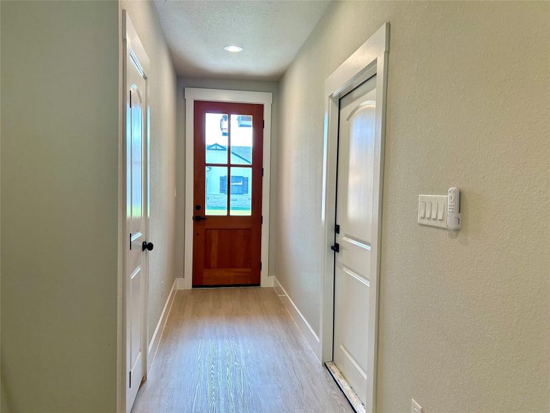 Tall 8 foot door at entrance.