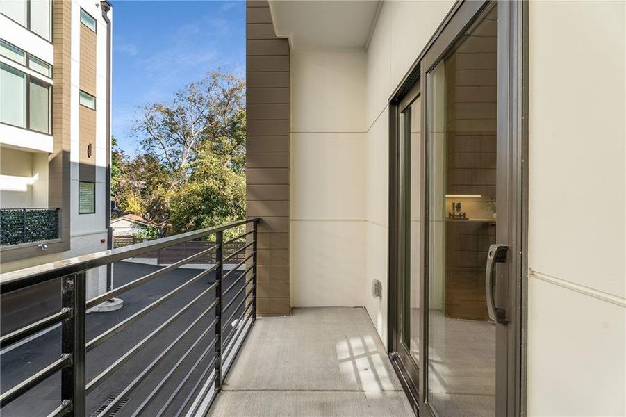 Exterior details and patio area of a home in Freedom Townhomes, Atlanta (Image 1).