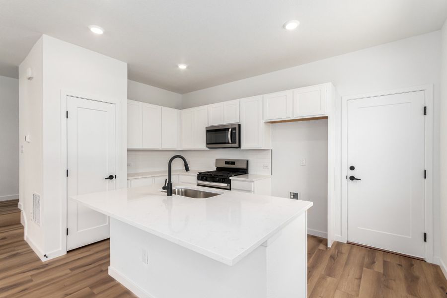 Furnished interior view inside a new home in Painted Prairie, Aurora (Image 6).