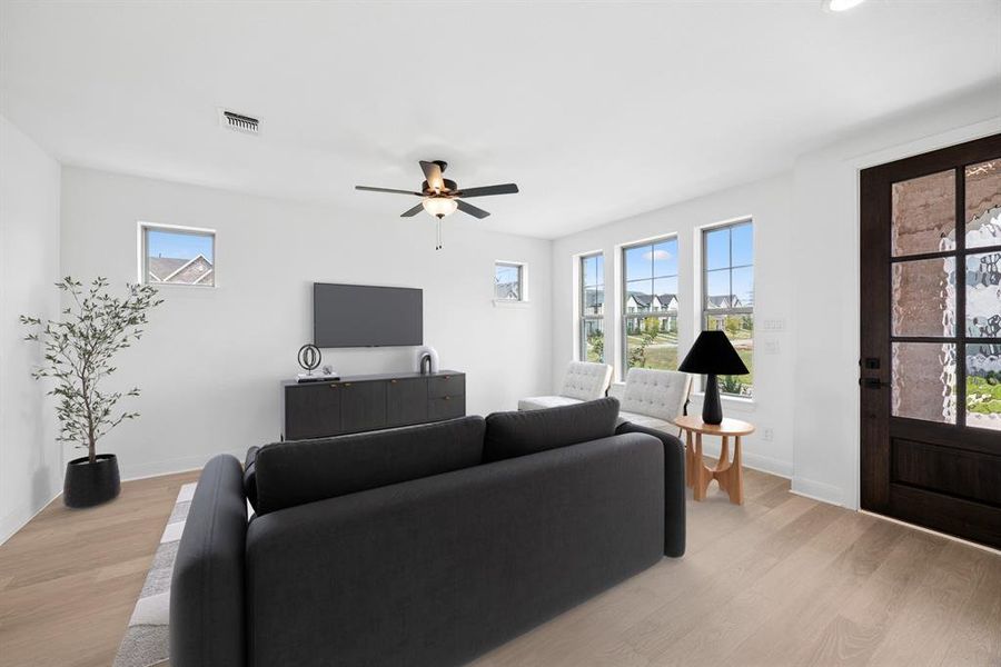 Furnished interior view inside a new home in Karis - Cottage Series, Crowley (Image 7).