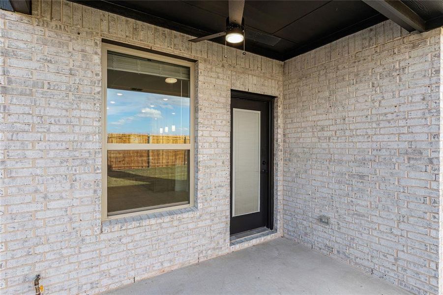 Exterior details and patio area of a home in West Crossing, Anna (Image 27). Exterior details and patio area of a home in West Crossing, Anna (Image 27).