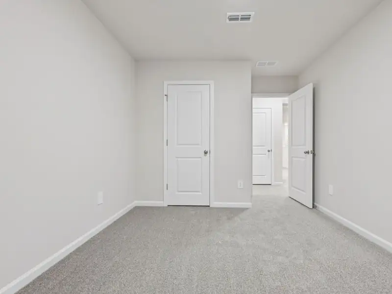 Spacious, unfurnished interior of a new home in The Rows at Buffaloe Reserve, Raleigh (Image 20). Spacious, unfurnished interior of a new home in The Rows at Buffaloe Reserve, Raleigh (Image 20).