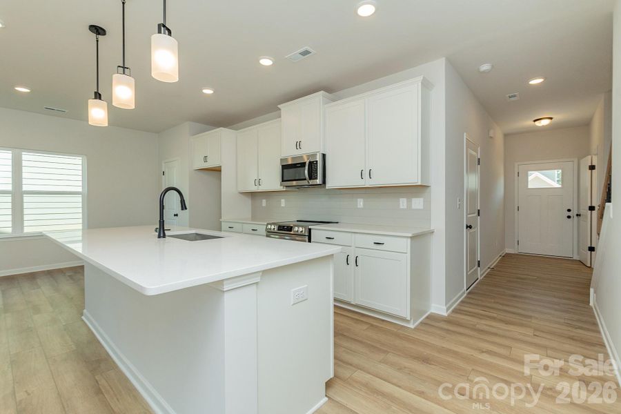 Furnished interior view inside a new home in Sunset Meadows, Charlotte (Image 4).